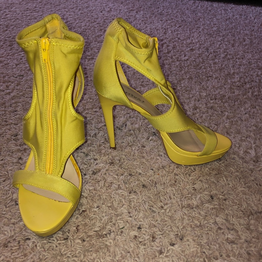 Yellow heels. Gently worn. Smoke free home.